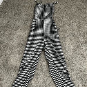 Black and white checkered jumpsuit from Showpo size US 10
